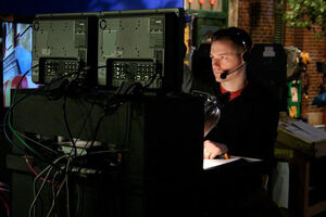 Directing on the set of Sesame Street.