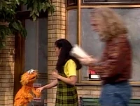 Sesame Street Episode 3380Passerby reading during "Counting Song"