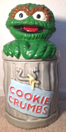 https://static.wikia.nocookie.net/muppet/images/0/06/Demand_marketing_oscar_cookie_jar.jpg/revision/latest/scale-to-width-down/250?cb=20161111151355