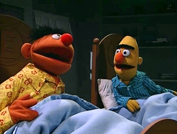 As they sing and reminisce about their time together, a montage of classic Ernie...