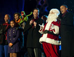 Malia, Sasha and Michelle Obama, Kermit the Frog, Carson Daly, Steve Whitmire, Santa Claus and Barack Obama in 2011.