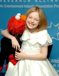 Dakota Fanning & Elmo Hollywood Hits Broadway Benefit Gala