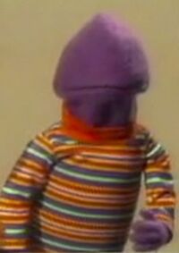 A blank-faced Purple Anything Muppet