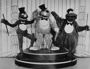 Grover, Stuie, and Cookie Monster perform "