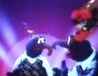 Gonzo and his duplicates tap-dance to "Tea For Two" on multiple screens in the Muppet*Vision 3D pre-show.