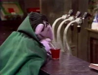 Count von Count sips a soda at Hooper's Store in Episode 0829.