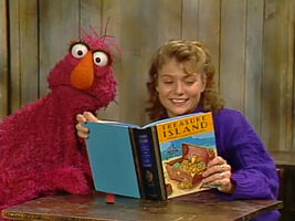 Gina reads the book to Telly and Barkley in Sesame Street Episode 2617