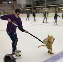 BTTR-MattOnIce.jpg (220 KB) Ben Durocher helps Uncle Matt with his sliding.