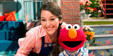 Nina with Elmo