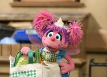 5202-AbbyGrocer.jpg (3.2 MB) Abby dressed as a grocer during the "People in Your Neighborhood" song.