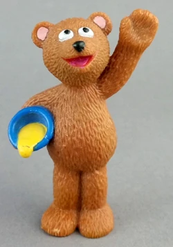 Baby Bear with a bowl of porridge