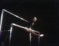 'Slow' She performs an uneven bars routine in slow motion. (EKA: Episode 0546)