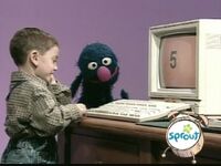 Grover watches Matthew type a 5 (First: Episode 3917)