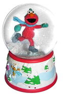 Elmo skating snowglobe. Plays "Let It Snow! Let It Snow! Let It Snow!" (2009) SE8801