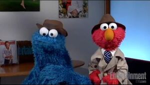Elmo and Cookie Monster are bored.