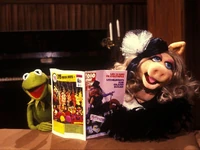 Kermit the Frog and Miss Piggy with a 1980 issue promoting The Muppet Movie