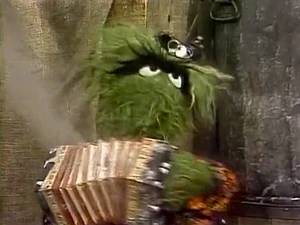  plays a dust-spewing accordion in .