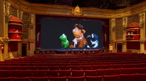Kermit, Fozzie and Gonzo talk to Bean, who's hiding in the balcony.