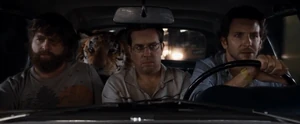 Cooper (right) with  and  in The Hangover