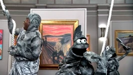 Chris, Cookie Monster and Elmo as statuesThe Cookie Thief