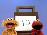 10 with Elmo and Zoe