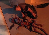 JackAncient2.jpg (107 KB) Crichton kneels over Jack's body.