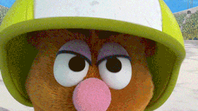 Sesame Street: Benjamin Bratt and Elmo translate for a Tiger