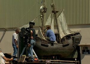 The miniature Hispaniola being shot in the studio parking lot.