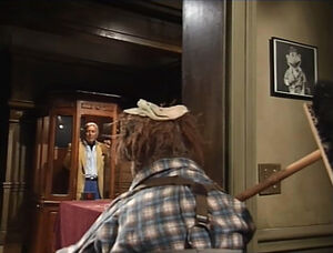 A framed photo of Scooter at the end of Muppets Tonight .