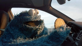 Cookie Monster driving a BMW in a 2015 BMW commercial