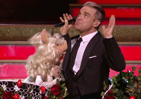 Robbie Williams & Miss PiggyOne Night at the Palladium