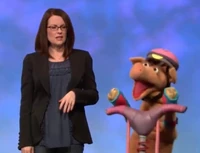 A pig in a "Word of the Day" segment with Megan Mullally.