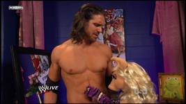 Miss Piggy gets touchy with John Morrison...