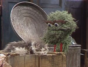 Oscar bonds with Tiny Tim.