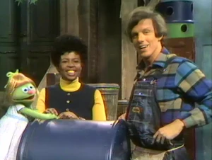 Lofton as John on Sesame Street