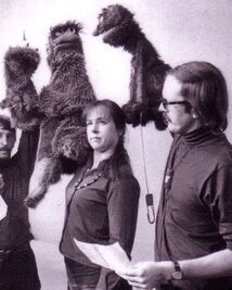 Wilcox performing on Sesame Street with Caroll Spinney and Frank Oz.