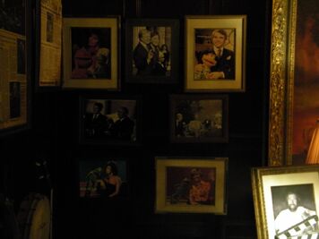 Celebrity photos in Kermit's office, including The Muppet Show guests Steve Martin, Raquel Welch, Florence Henderson, Kermit on The Tonight Show and doctored photos of Kermit with Jimmy Carter, Ronald Reagan and Mikhail Gorbachev