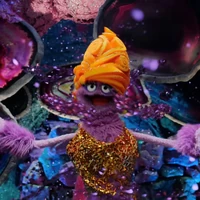 The Great Glitterinivoiced by Adam Lambert Back to the Rock