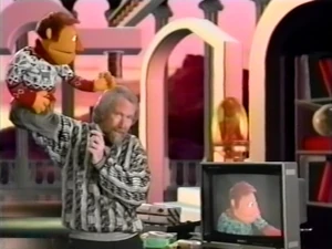 Jim Henson demonstrating the monitor's role in television puppetry in "