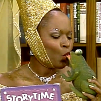 Alaina Reed (Olivia) & a frog"At Your Library"