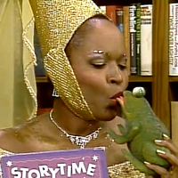 Alaina Reed (Olivia) & a frog Sesame Street "At Your Library"