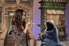 Olivia Munn with Cookie Monster