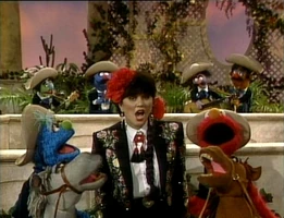 Linda Ronstadt on Sesame Street with Elmo and Parker.