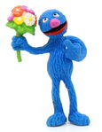 Grover with a bouquet of flowers