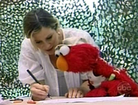 Tracy Hutson and Elmo in the November 25, 2007 appearance.