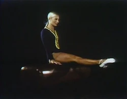 'On' and 'Off' She mounts a balance beam, dismounts it, then repeats everything in fast motion. (First: Episode 0526)