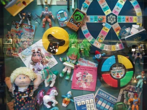 Pop Century 1.jpg (3.29 MB) Disney's Pop Century Resort is themed for the decades of the 20th century. Its main hall features a timeline of pop culture items framed in glass cases. A photo from The Miss Piggy Cover Girl Fantasy Calendar is featured in this case from the early 1980s.