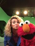 Tori Kelly and Elmo take a selfie