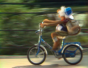Uncle Traveling Matt riding a bike.