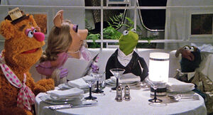 Fozzie, Piggy, Kermit and Gonzo, ready to dine at the exclusive club